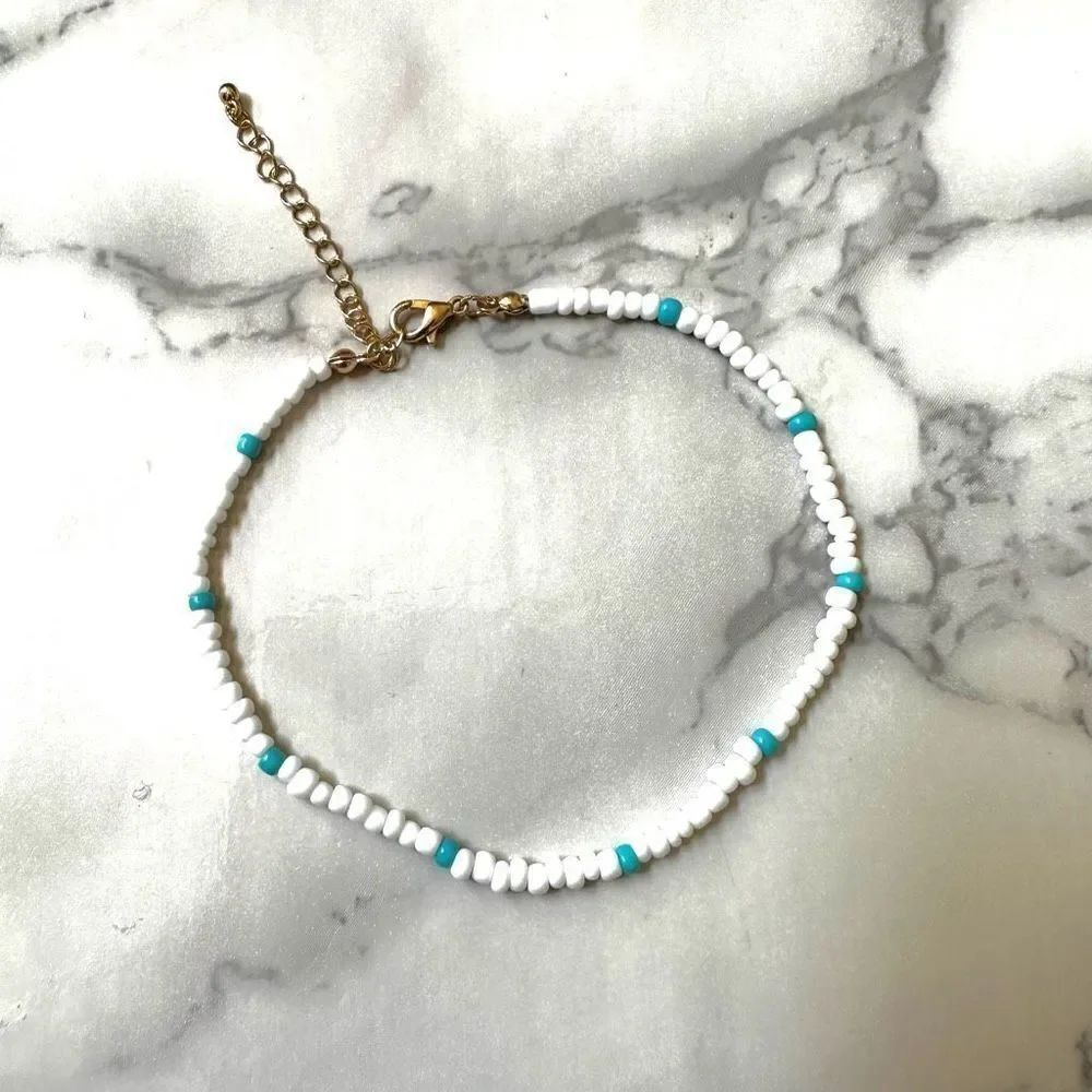 White and blue beaded bracelet